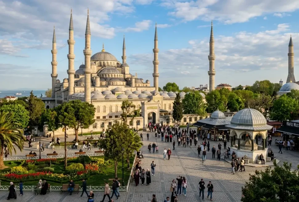 Panoramic view of the iconic Blue Mosque Sultan Ahmed Mosque in Istanbul Turkey with gardens and tourists