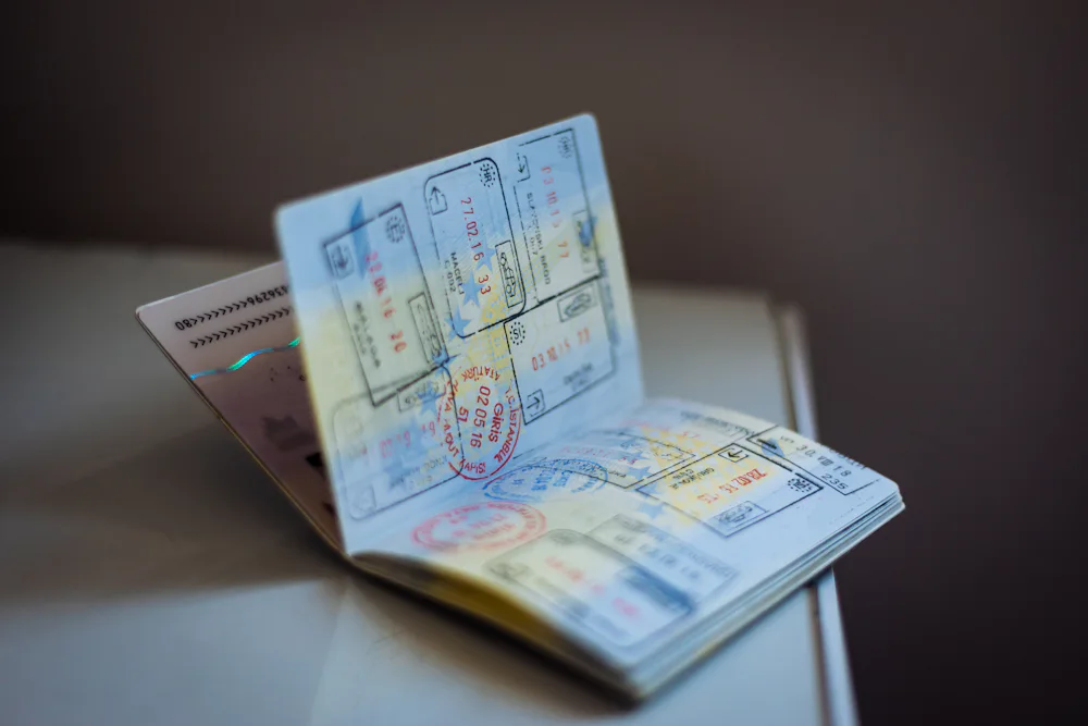Passport with many travel stamps